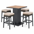 Ensemble table haute en métal noir et tabourets en rotin avec coussins beiges